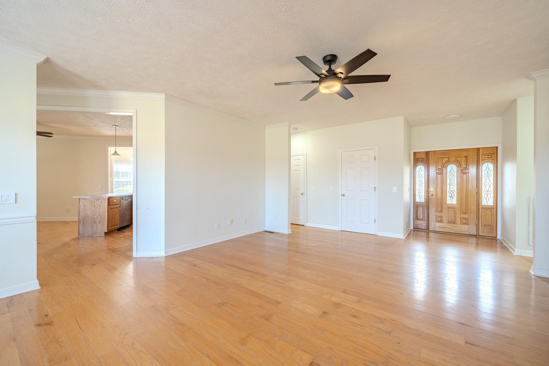 185 Leath Lane Finger, TN 38334 - Photo 9 of 34 a view of a livingroom with a ceiling fan and window