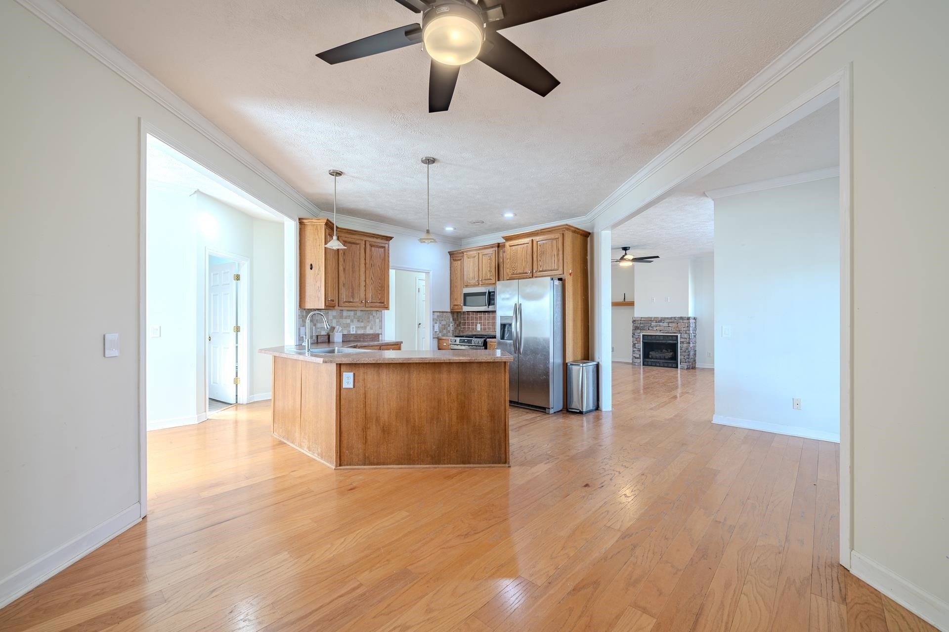 185 Leath Lane Finger, TN 38334 - Photo 10 of 34 a large kitchen with stainless steel appliances kitchen island granite countertop a refrigerator and a sink