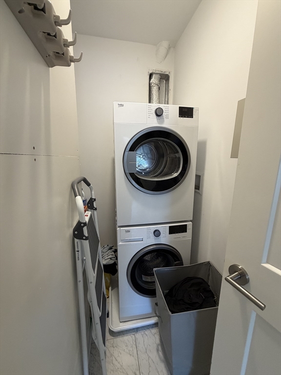 17 Hennery Way, Unit G Medfield, MA 02052 - Photo 11 of 12 a utility room with sink washer and dryer