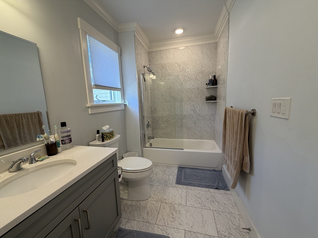 17 Hennery Way, Unit G Medfield, MA 02052 - Photo 12 of 12 a bathroom with a sink a toilet and bathtub