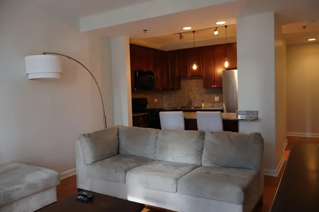 a living room with a couch and a coffee table