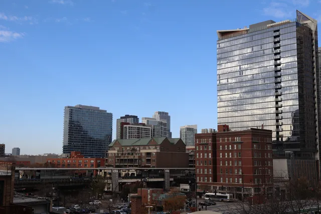 a view of a city with tall buildings
