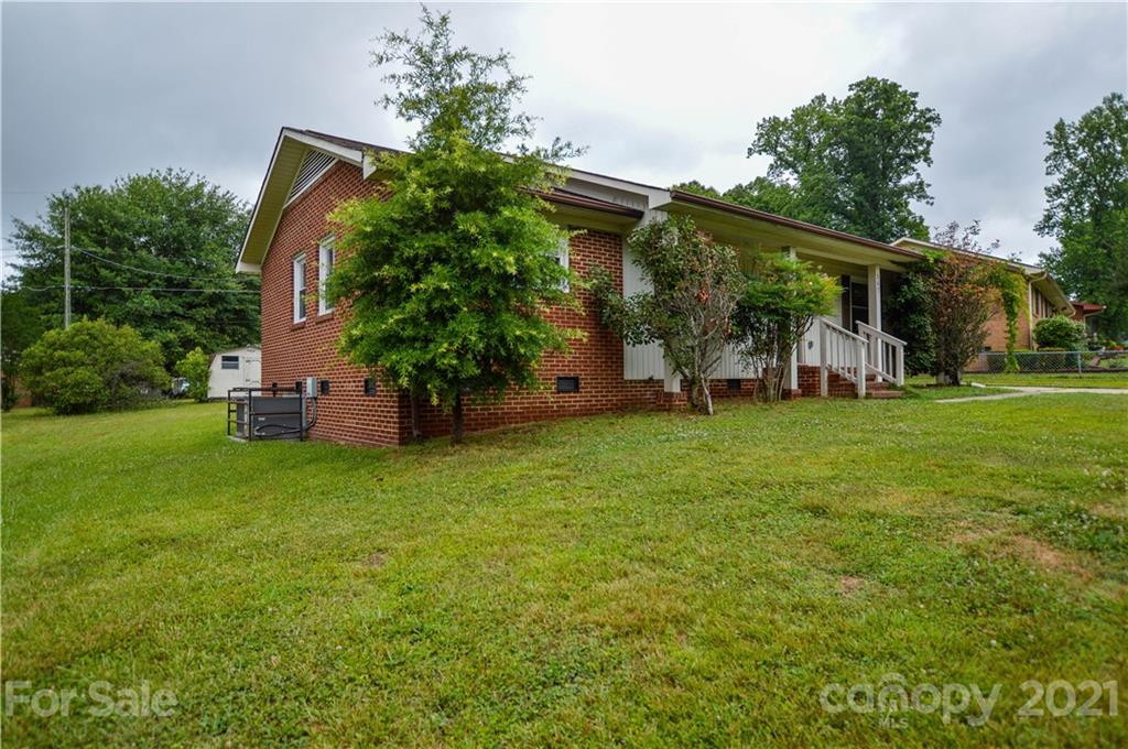 807 Squirrel Hill Road Charlotte, NC 28213 - Photo 2 of 34 a view of a couches in backyard of house