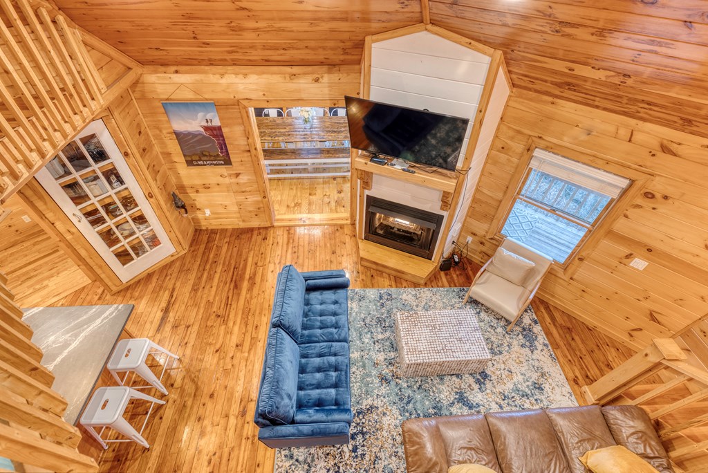 586 Newport Road Blue Ridge, GA 30513 - Photo 21 of 38 a view of furniture and fireplace