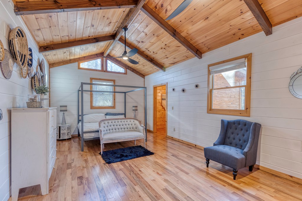 586 Newport Road Blue Ridge, GA 30513 - Photo 30 of 38 a living room with furniture and a wooden floor