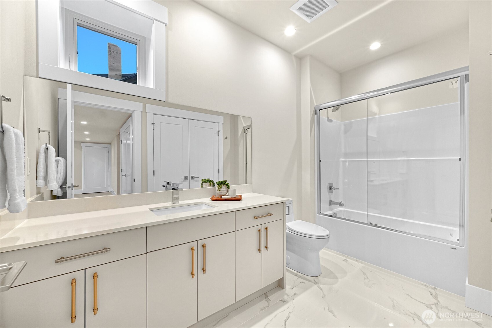 3713 Bristol Street Bellingham, WA 98226 - Photo 22 of 40 a bathroom with a double vanity sink mirror and toilet