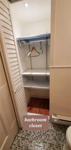 a close view of a utility room with washer and dryer