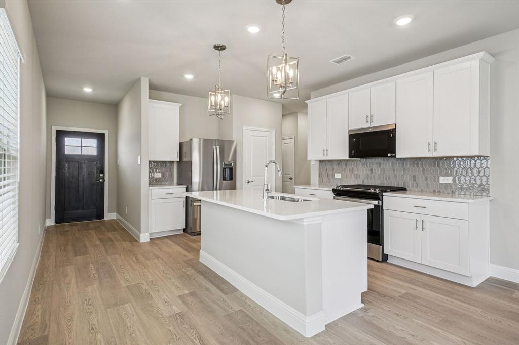 1701 Arches Road Anna, TX 75409 - Photo 3 of 27 Photo is not of the actual home, but is an inspirational photo of builder’s model home and may depict options, furnishings, and/or decorator features that are not included.