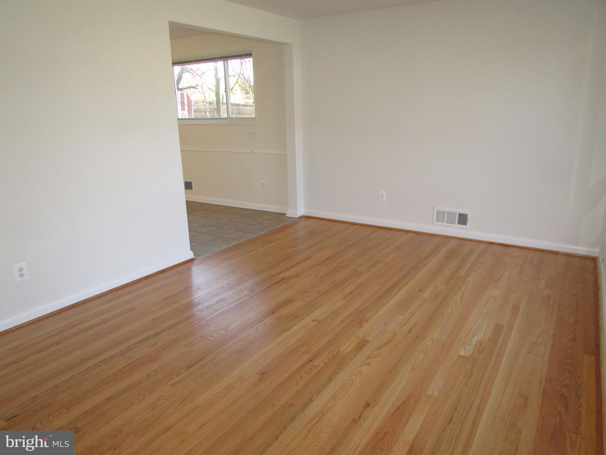 3918 Weller Road Silver Spring, MD 20906 - Photo 2 of 30 Living Room refinished hardwoof floors