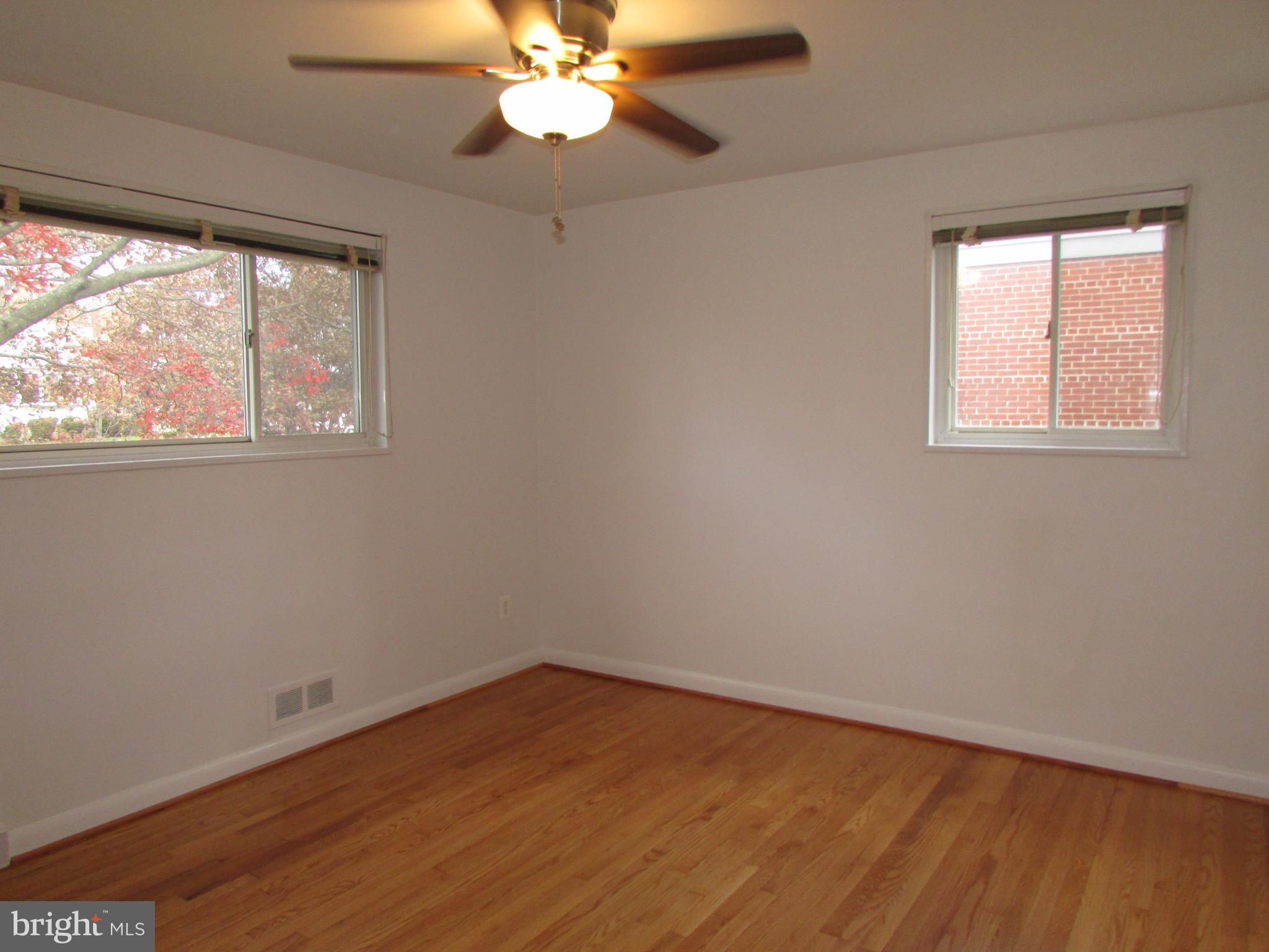 3918 Weller Road Silver Spring, MD 20906 - Photo 11 of 30 Main level bedroom 1 with new ceiling fan