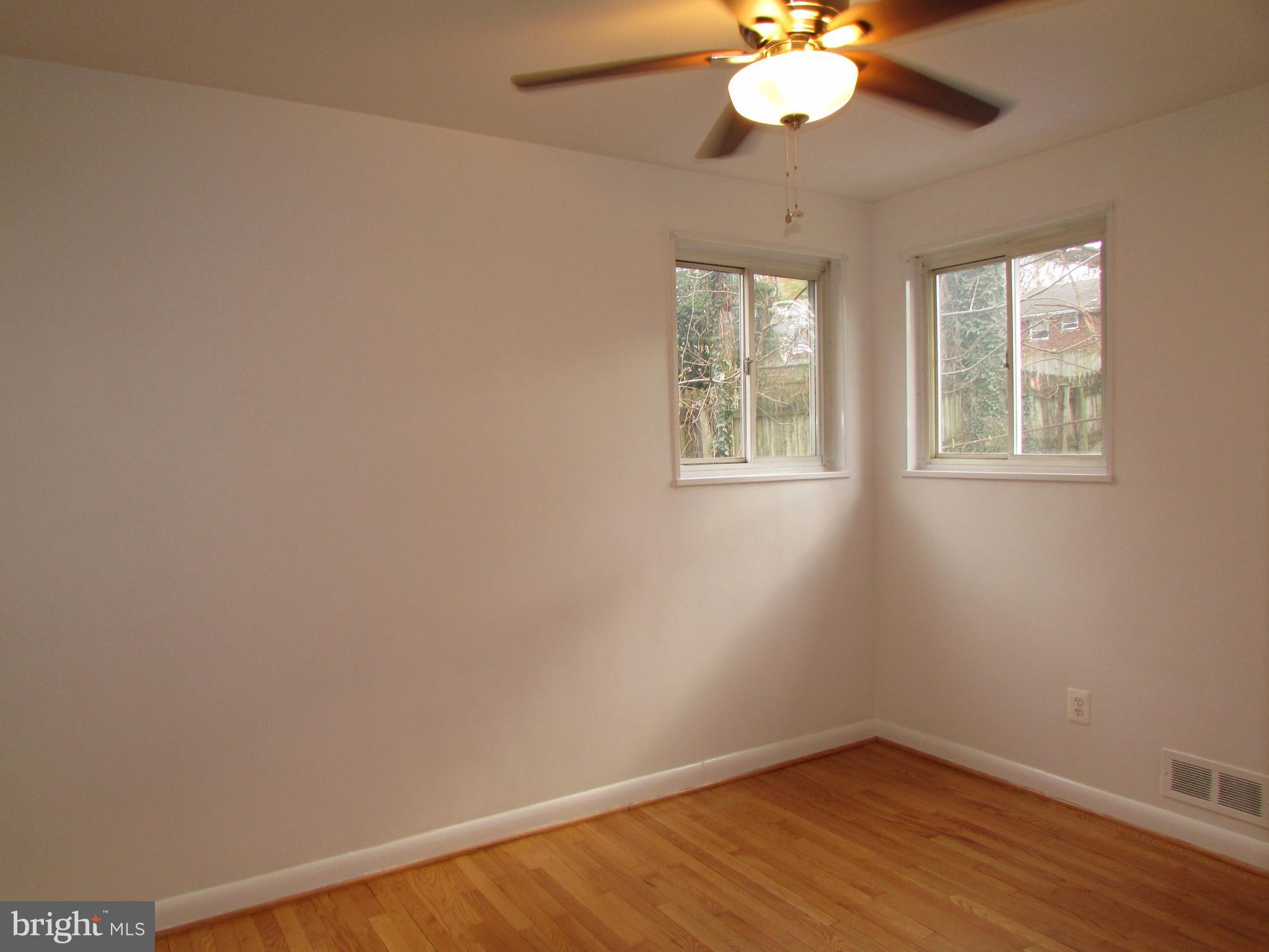 3918 Weller Road Silver Spring, MD 20906 - Photo 12 of 30 Main level bedroom 2 with new ceiling fans