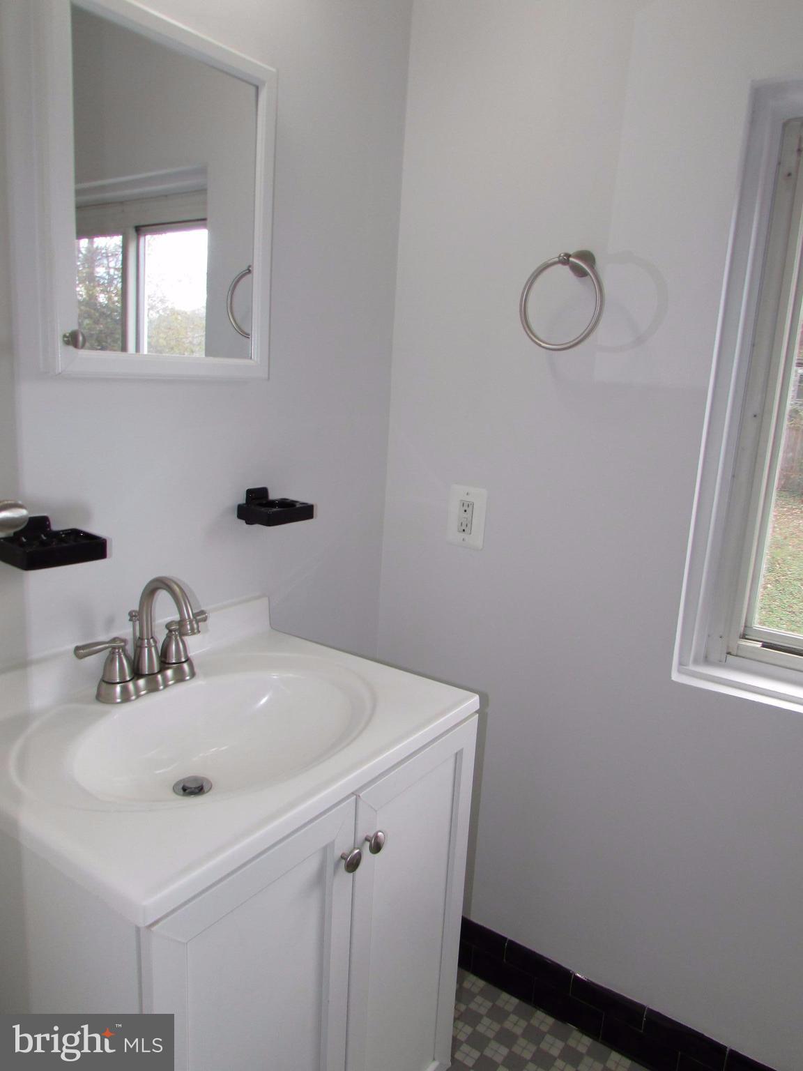 3918 Weller Road Silver Spring, MD 20906 - Photo 19 of 30 Upper level full bath art deco!