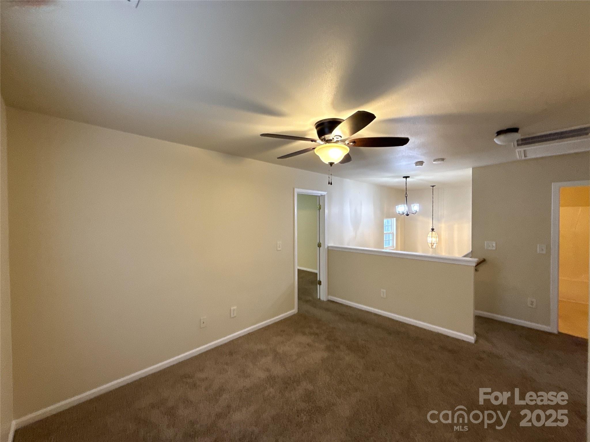 6831 Sunman Road Charlotte, NC 28216 - Photo 13 of 16 a view of an empty room