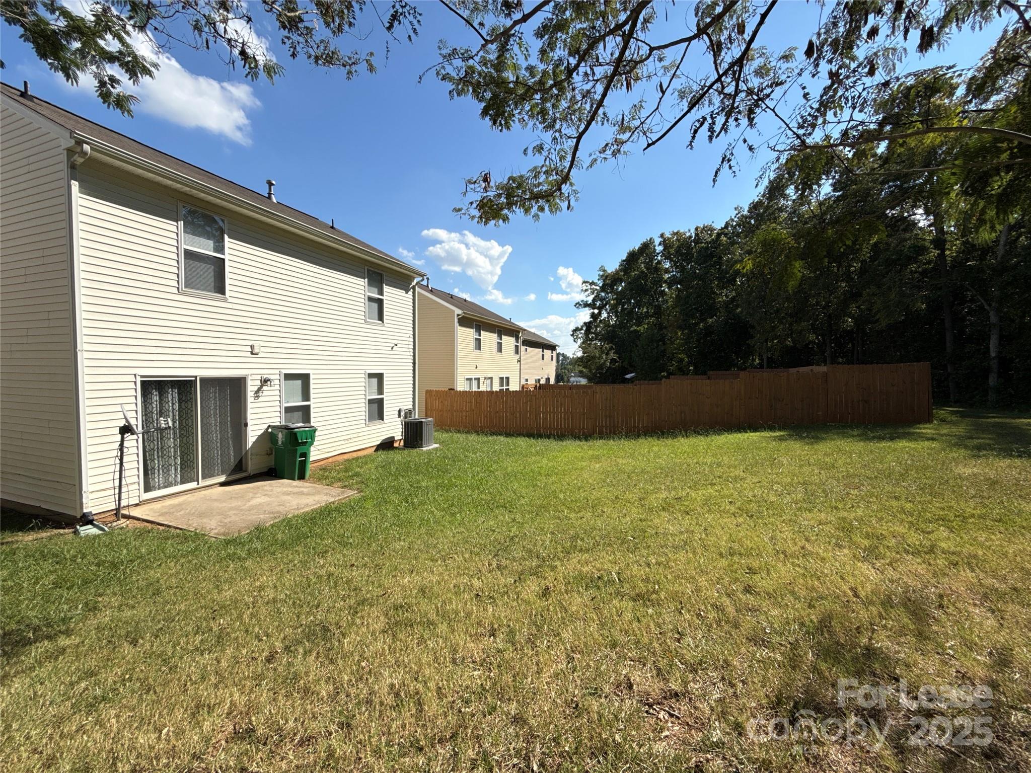 6831 Sunman Road Charlotte, NC 28216 - Photo 15 of 16 a view of outdoor space and yard