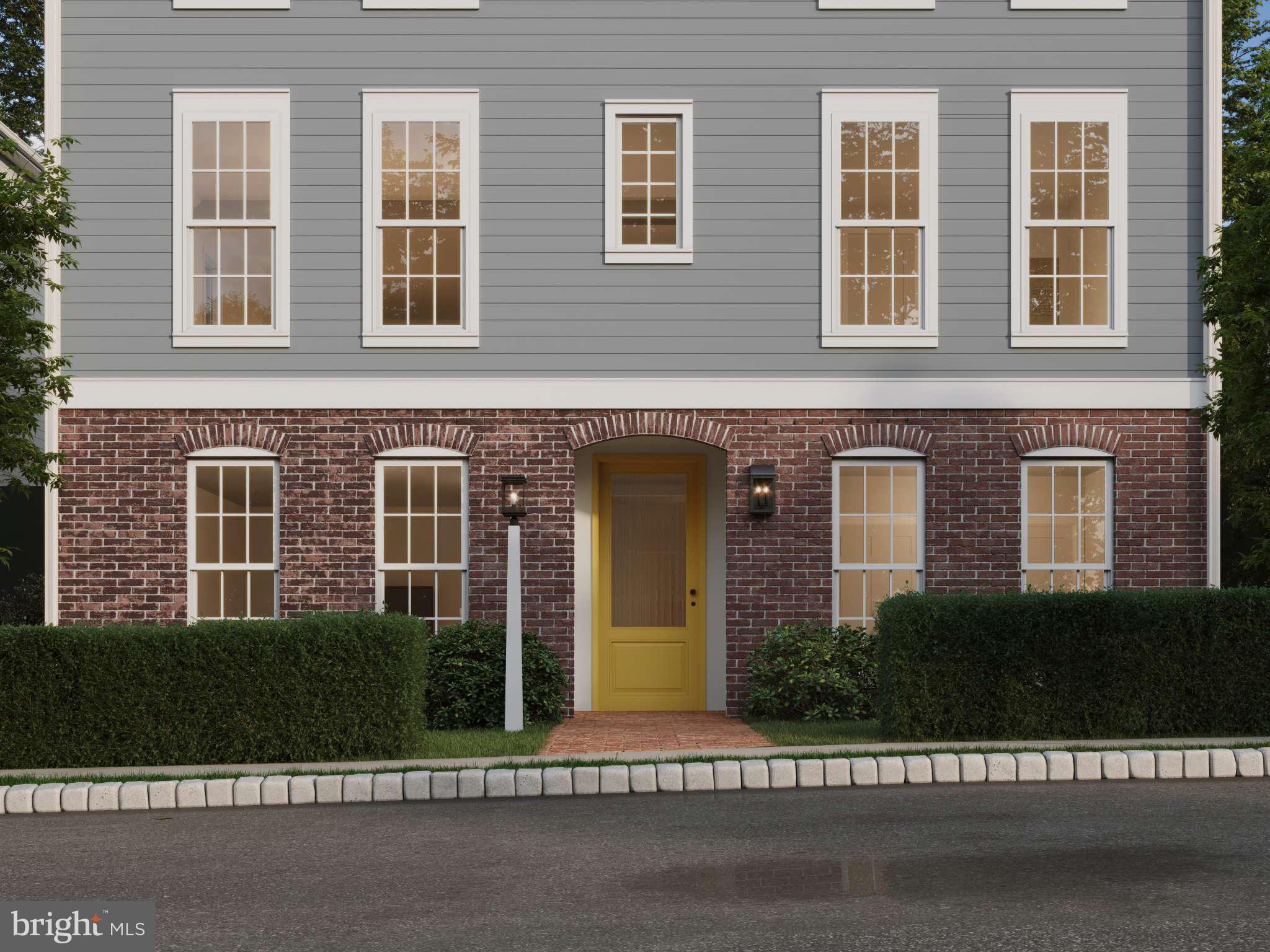 104 Merchant Avenue, Unit BROMLEY Mount Joy, PA 17552 - Photo 14 of 33 front view of a brick house and a yard