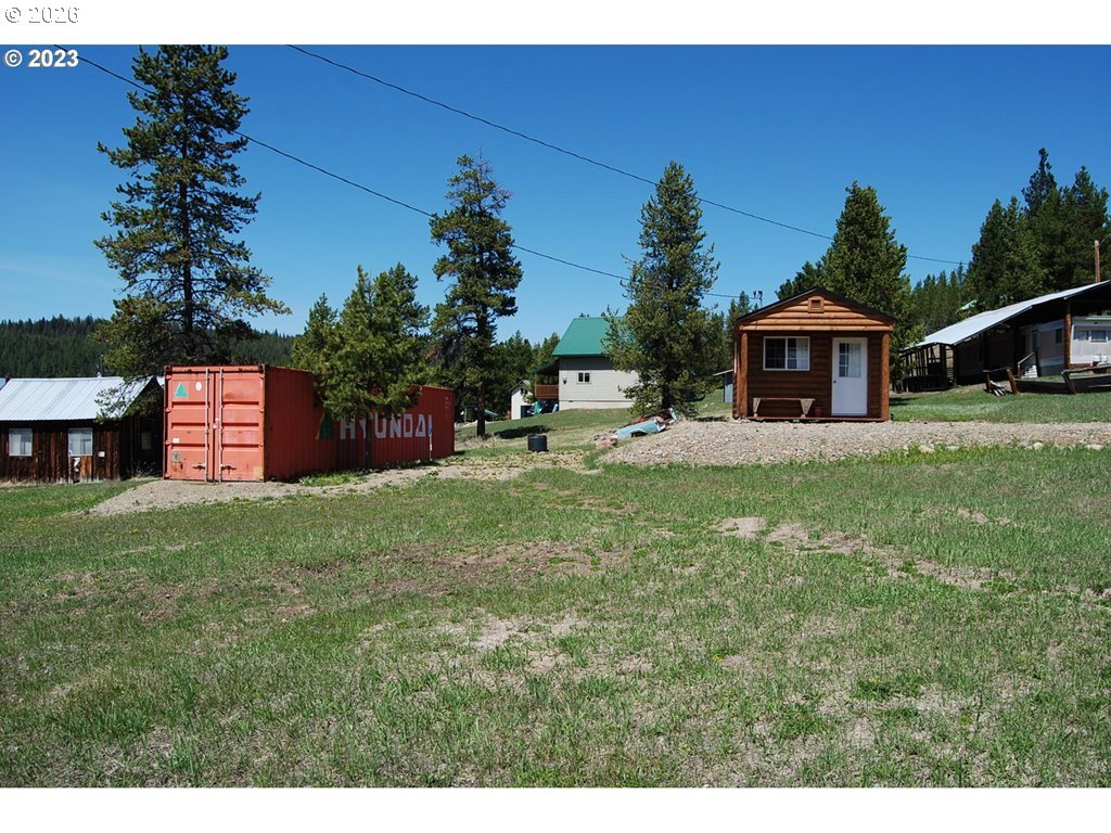 1442 Center Street Sumpter, OR 97877 - Photo 5 of 13 a front view of a house with a yard