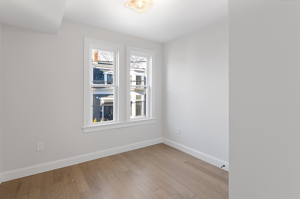 19 George Street, Unit 3 Somerville, MA 02145 - Photo 13 of 20 an empty room with a window