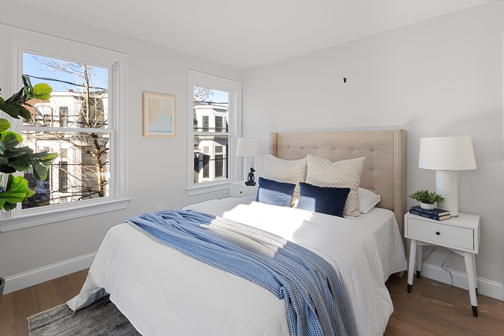 19 George Street, Unit 3 Somerville, MA 02145 - Photo 9 of 20 a bedroom with a bed and a window