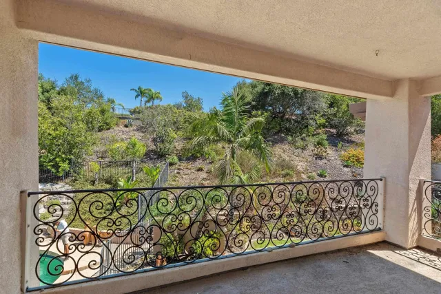 a room with furniture and mirror