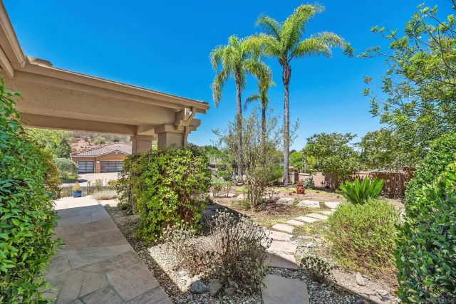 a view of entryway and hall with a front door