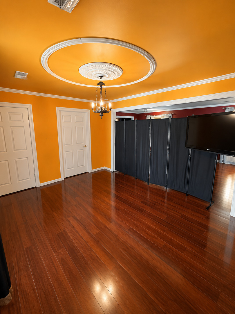 354 19th Place Clinton, IA 52732 - Photo 7 of 16 a view of a room with wooden floor