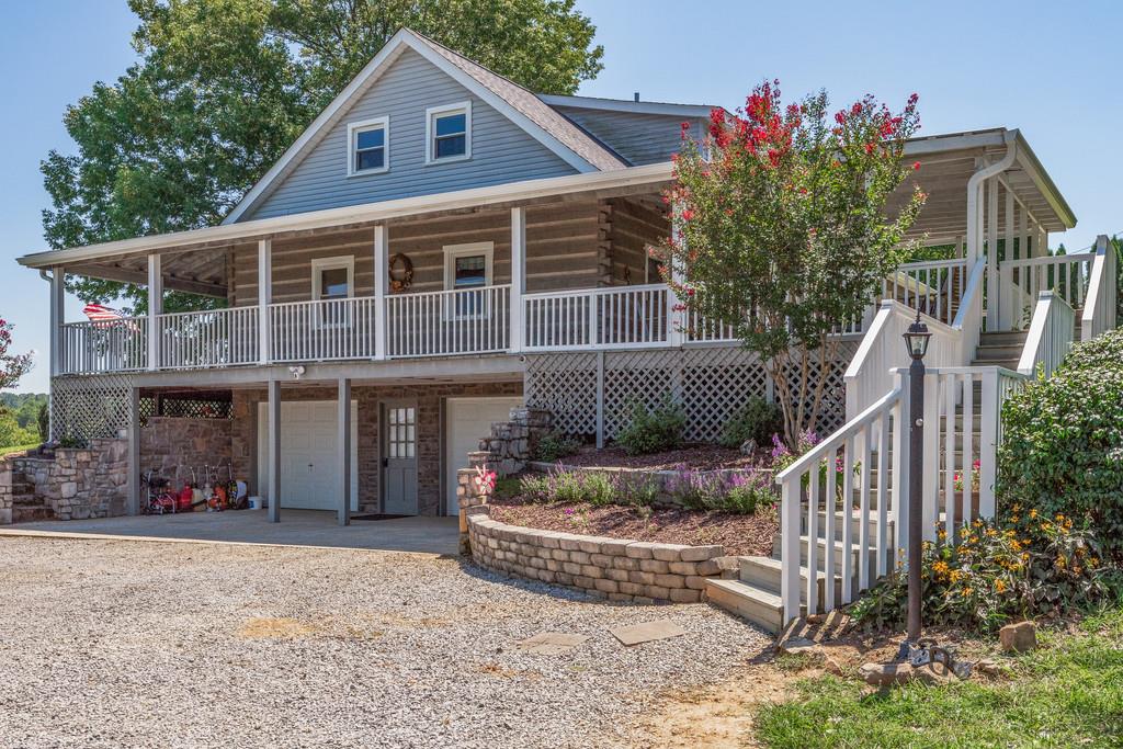 2812 Henry Gower Road Pleasant View, TN 37146 - Photo 3 of 23 a front view of a house with entertaining space