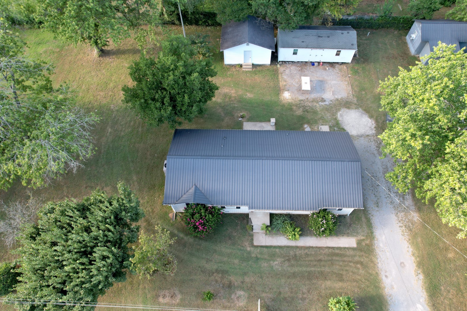 2278 North Ranch Road Murfreesboro, TN 37129 - Photo 9 of 16 an aerial view of a house with a yard and a fountain
