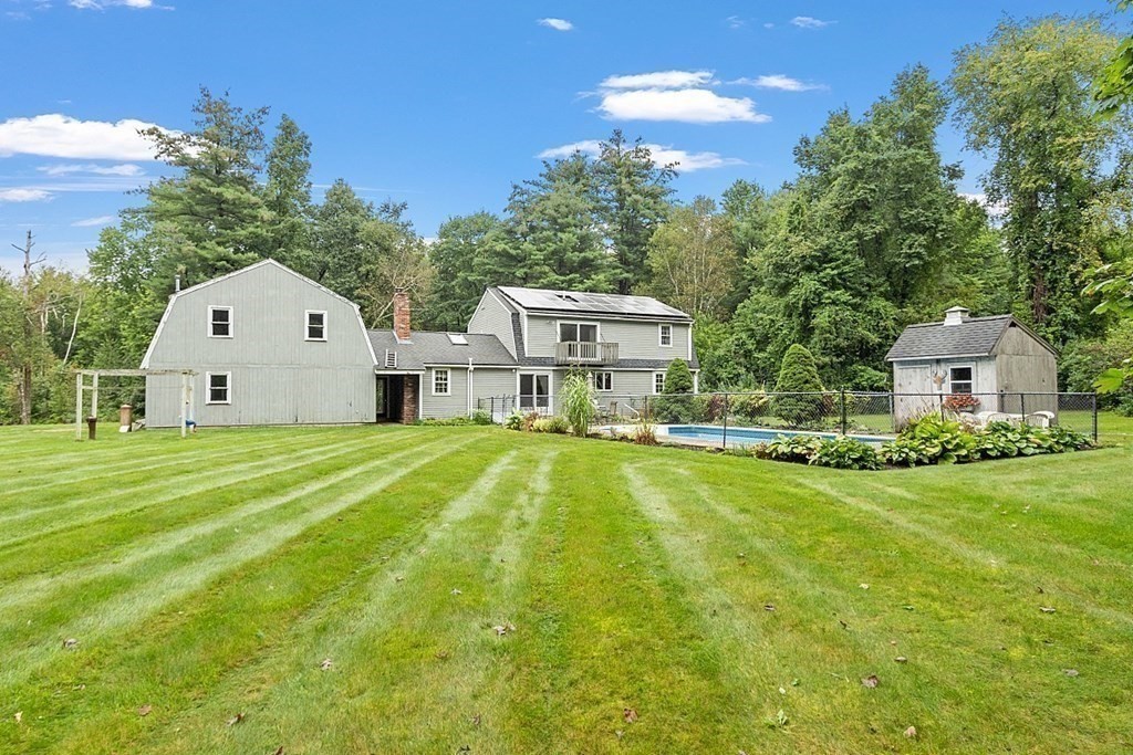 17 Saunders Road Townsend, MA 01474 - Photo 7 of 34 a view of house with backyard and garden