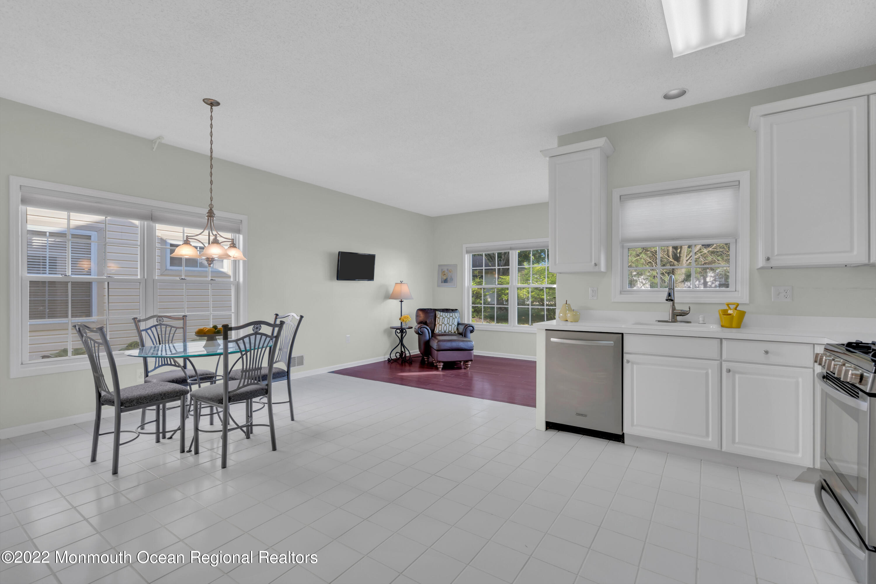 127 Riva Boulevard Brick, NJ 08723 - Photo 17 of 39 OPEN PLAN EAT-IN KITCHEN & SUN ROOM