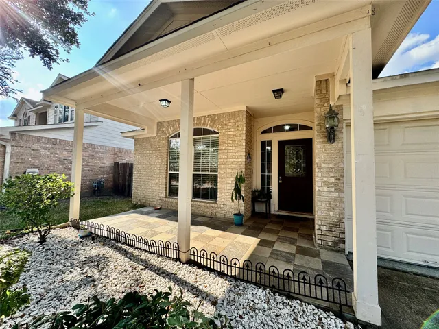 a front view of a house with a outdoor space