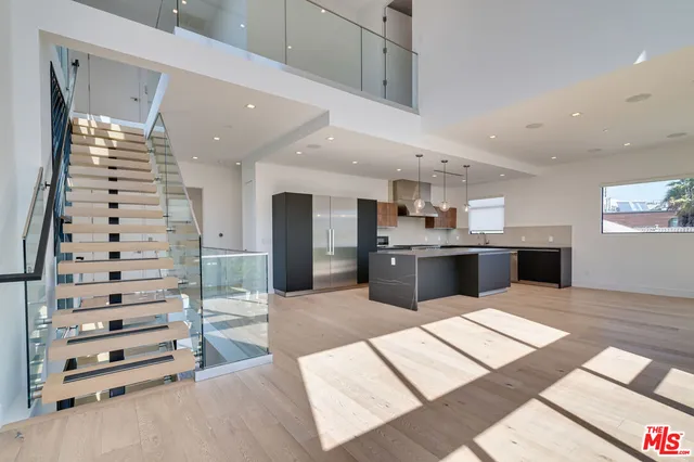 a bathroom with a sink a toilet and bathtub