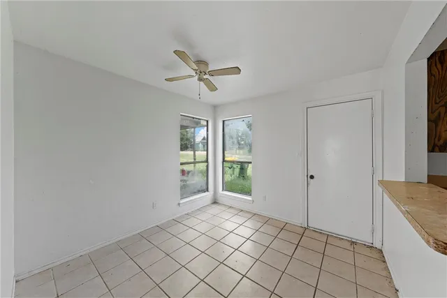 a kitchen with stainless steel appliances a sink and a refrigerator
