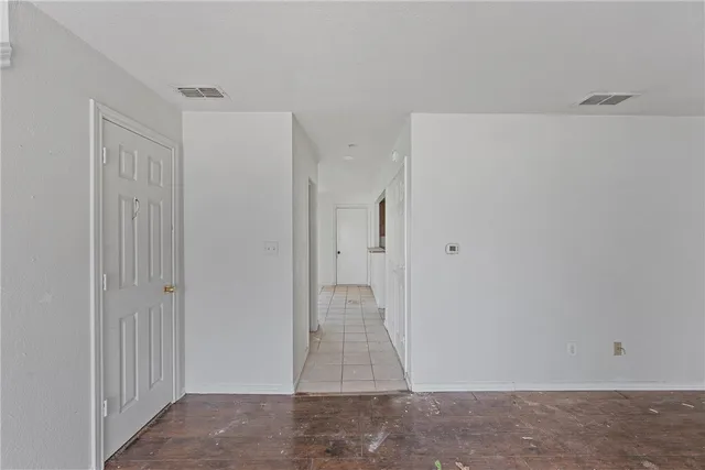 a view of entryway with wooden floor