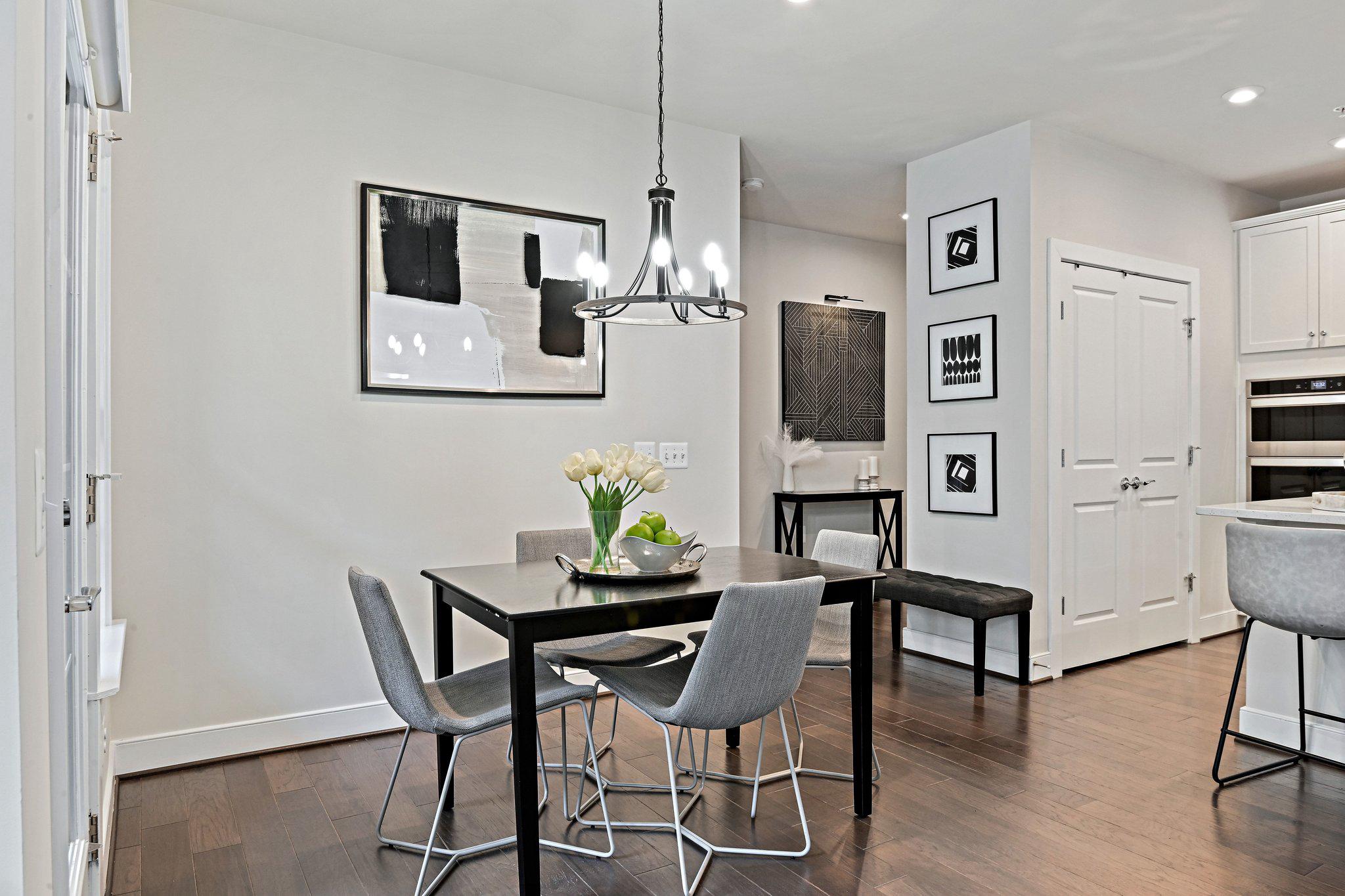 2320 Field Point Road, Unit 4102 Herndon, VA 20171 - Photo 11 of 39 a view of a dining room with furniture
