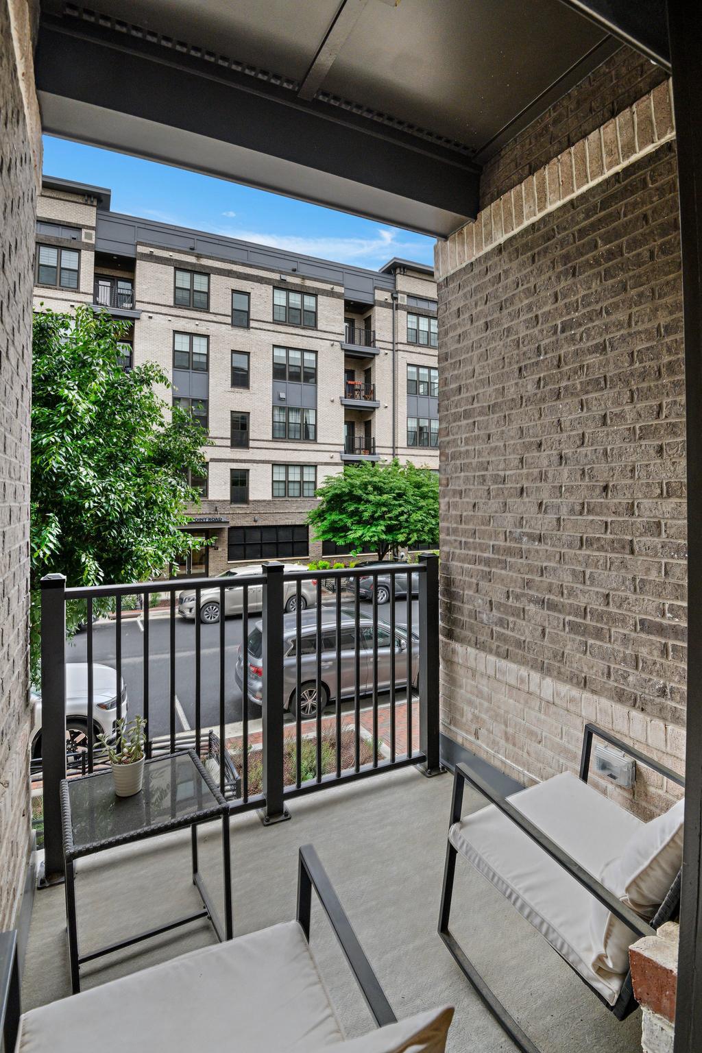 2320 Field Point Road, Unit 4102 Herndon, VA 20171 - Photo 13 of 39 a view of a balcony with chairs