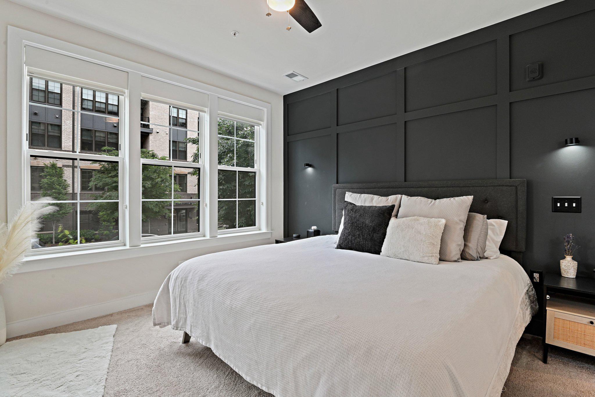 2320 Field Point Road, Unit 4102 Herndon, VA 20171 - Photo 16 of 39 a large bed sitting in a bedroom next to a window