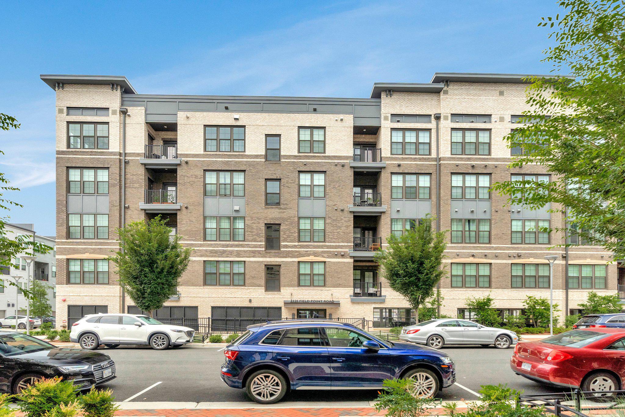 2320 Field Point Road, Unit 4102 Herndon, VA 20171 - Photo 2 of 39 a car parked in front of a building