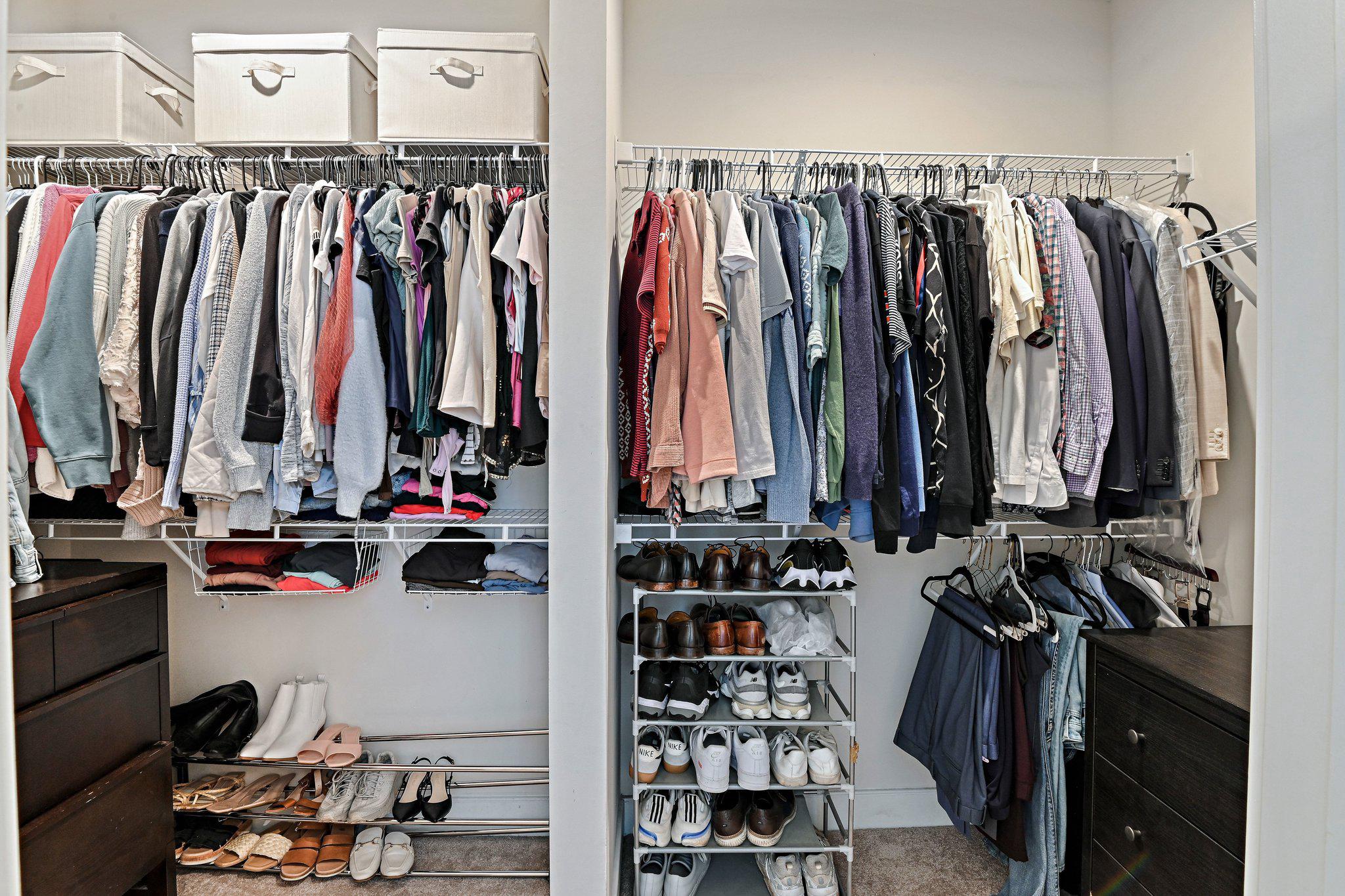 2320 Field Point Road, Unit 4102 Herndon, VA 20171 - Photo 21 of 39 a view of walk in closet with clothes and shoes