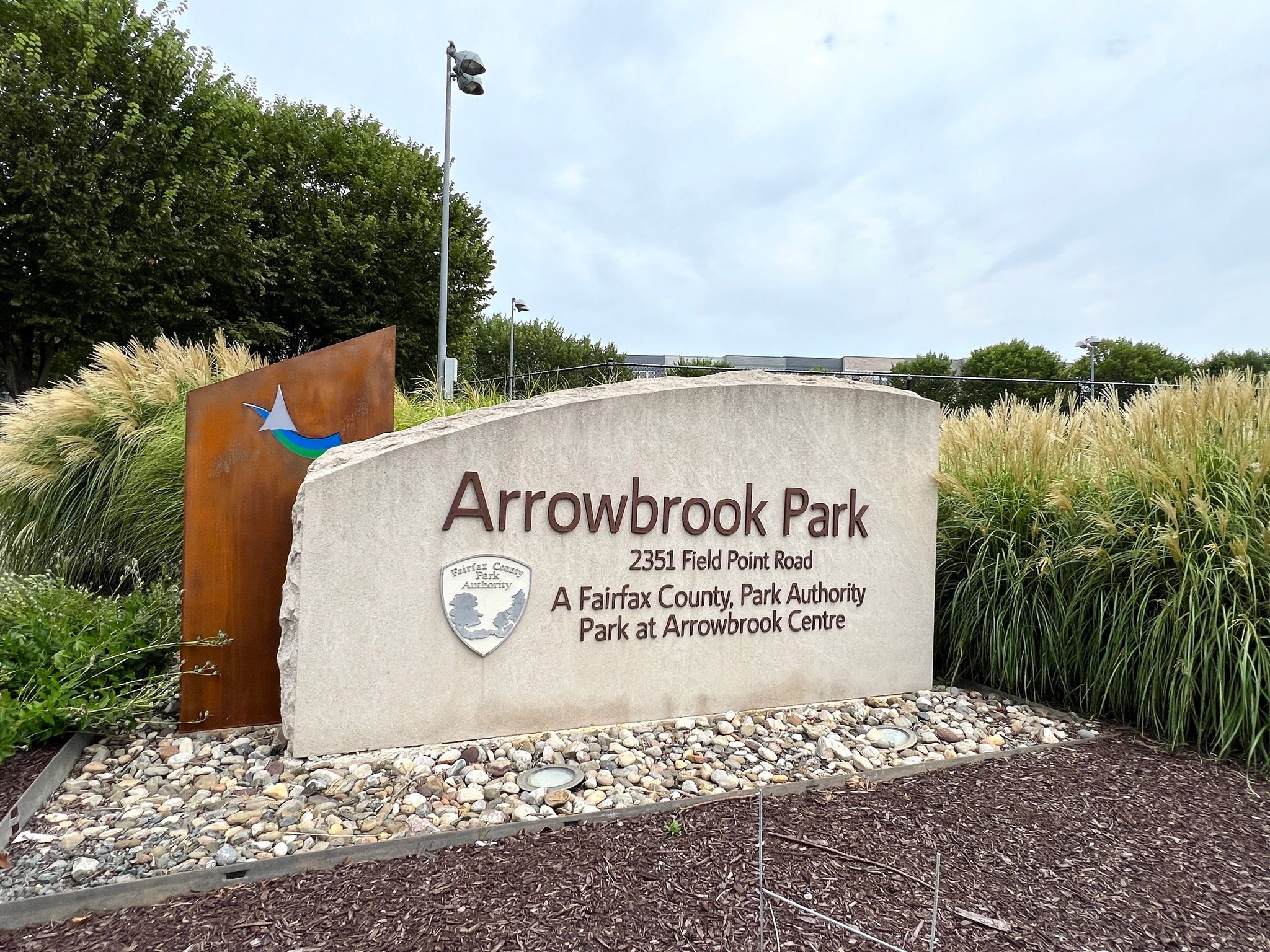 2320 Field Point Road, Unit 4102 Herndon, VA 20171 - Photo 29 of 39 a sign on the side of the road