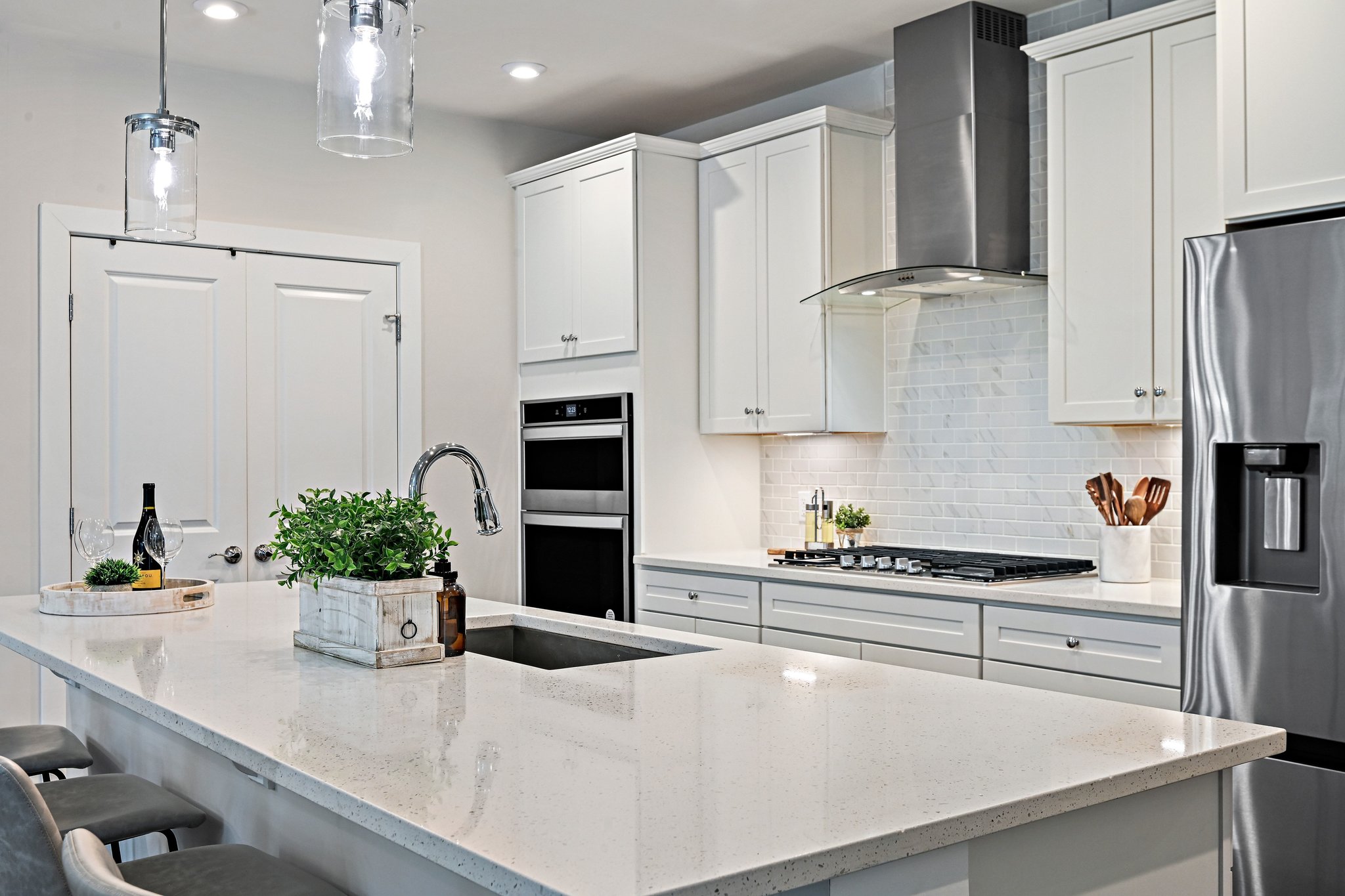 2320 Field Point Road, Unit 4102 Herndon, VA 20171 - Photo 3 of 39 a kitchen with stainless steel appliances kitchen island granite countertop a refrigerator a sink and white cabinets
