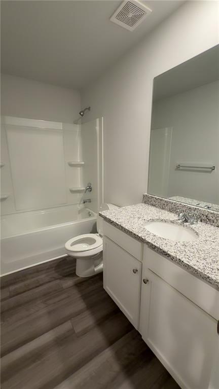 122 Brexley Drive Calhoun, GA 30701 - Photo 15 of 28 a bathroom with a granite countertop sink a toilet and bathtub