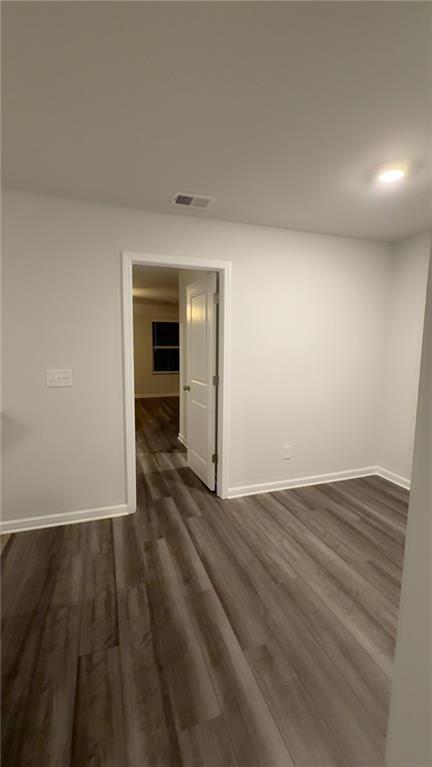 122 Brexley Drive Calhoun, GA 30701 - Photo 20 of 28 a view of a room with wooden floor and white walls