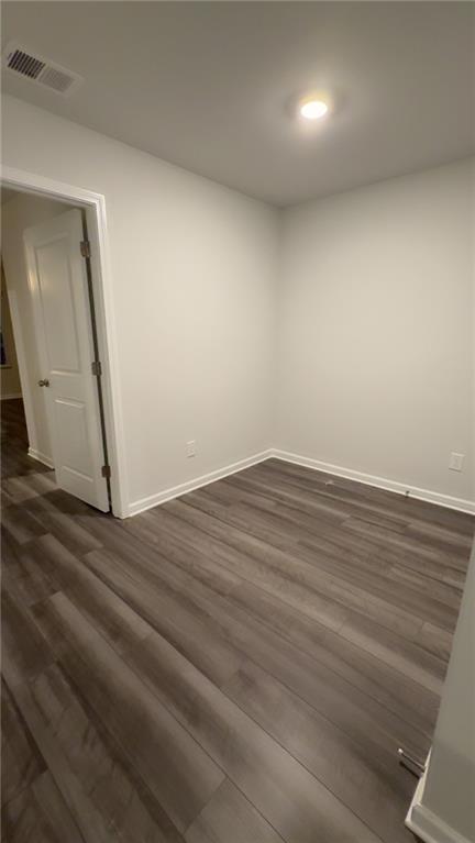 122 Brexley Drive Calhoun, GA 30701 - Photo 21 of 28 an empty room with wooden floor and entrance