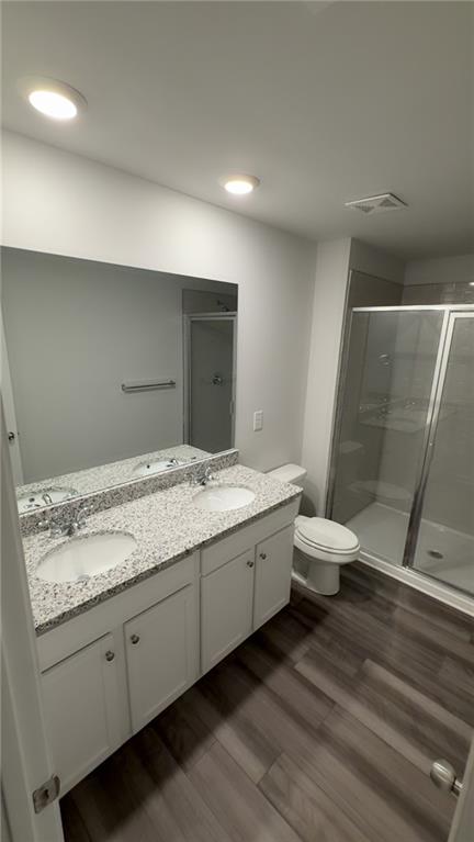 122 Brexley Drive Calhoun, GA 30701 - Photo 27 of 28 a bathroom with a granite countertop sink and toilet