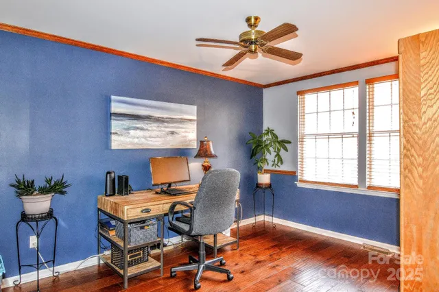 a workspace with furniture and window