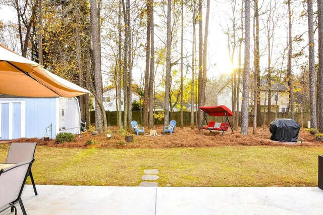 a view of swimming pool with outdoor seating