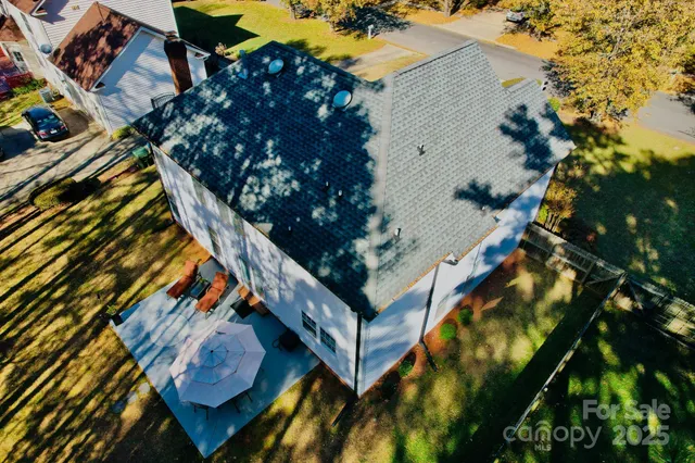 a backyard of a house with lots of green space