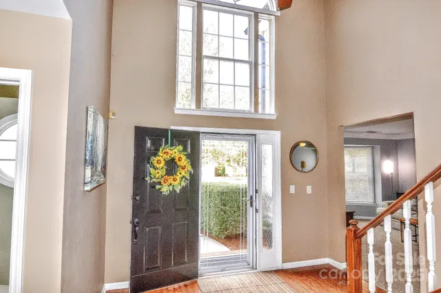 a view of entryway with wooden floor