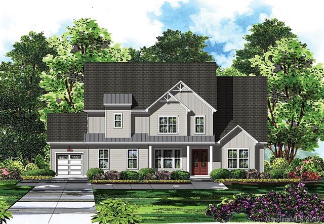 5359 Fewell Road Clover, SC 29710 - Photo 3 of 13 a front view of a house with a garden and plants