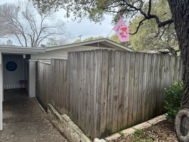 2414 South 5th Street, Unit A Austin, TX 78704 - Photo 3 of 18 a view of a backyard with a small cabin and a chair